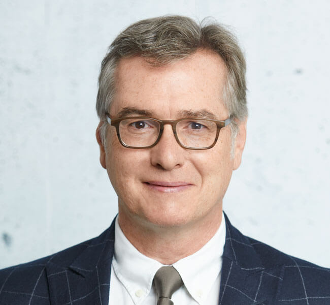 Dr. Henning  Rauls  (Partner)